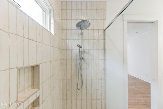 5312 Hanahan Dr, Wilmington, NC 28403 - full bath with a tile shower and wood finished floors