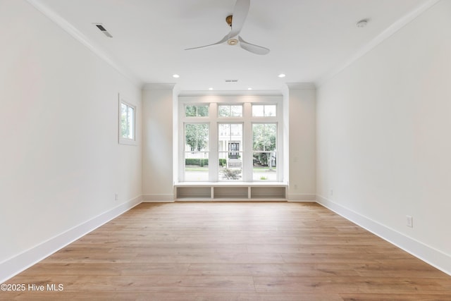 5312 Hanahan Dr, Wilmington, NC 28403 - empty room featuring crown molding, ceiling fan, light wood-style floors, recessed lighting, and a smoke detector