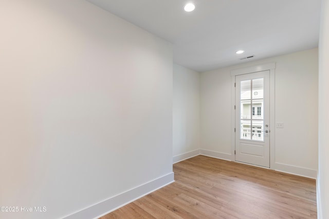 5312 Hanahan Dr, Wilmington, NC 28403 - empty room featuring light wood finished floors and recessed lighting