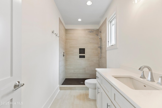 5312 Hanahan Dr, Wilmington, NC 28403 - full bathroom with tiled shower, vanity, and recessed lighting