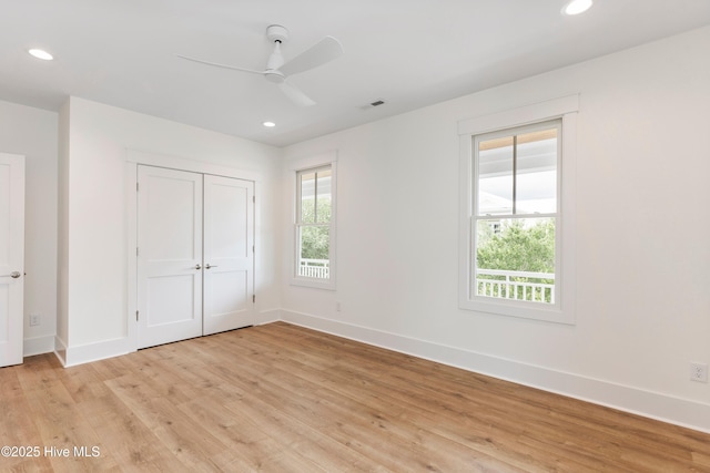 5312 Hanahan Dr, Wilmington, NC 28403 - unfurnished bedroom with light wood-type flooring, recessed lighting, a closet, and ceiling fan
