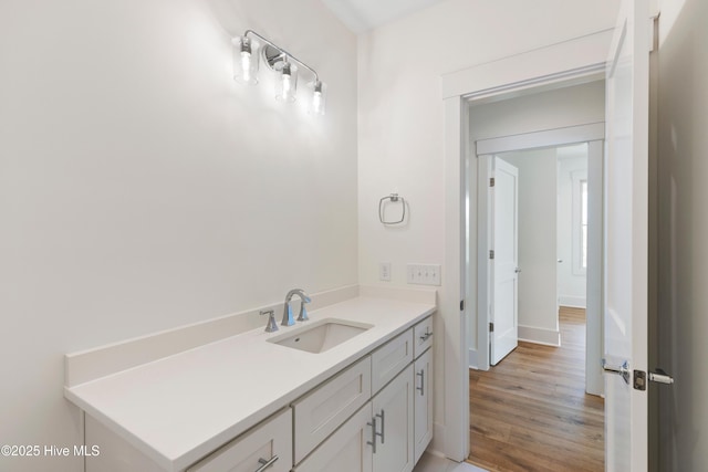 5312 Hanahan Dr, Wilmington, NC 28403 - bathroom featuring wood finished floors and vanity