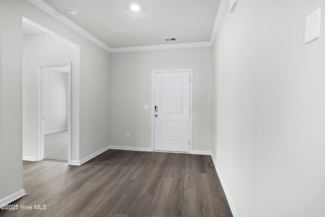 unfurnished room with dark hardwood / wood-style floors and ornamental molding