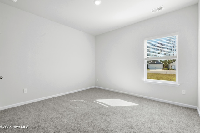 empty room featuring carpet floors