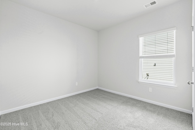 spare room with carpet flooring