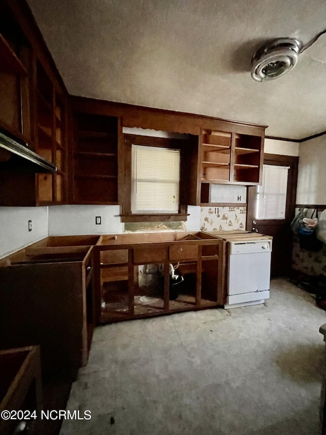 kitchen with light colored carpet