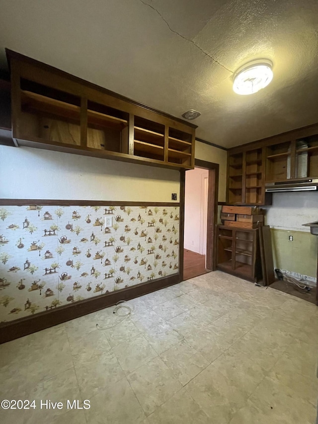 kitchen featuring a textured ceiling