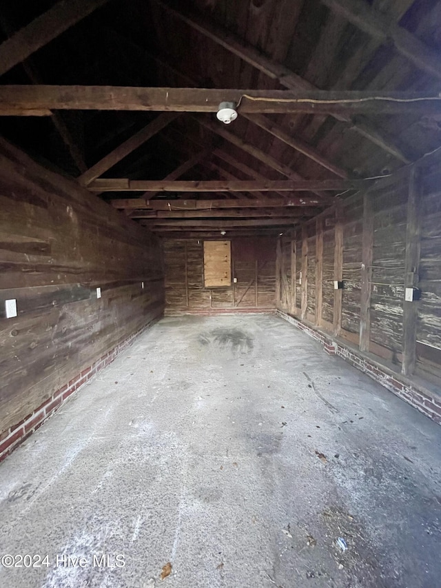 miscellaneous room featuring vaulted ceiling