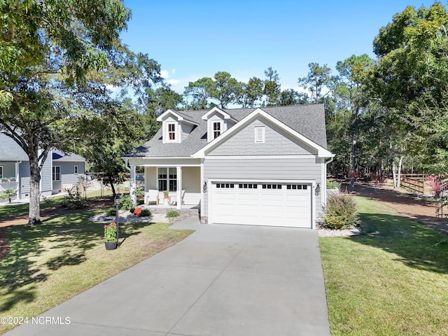 view of front of property with a front yard and a porch