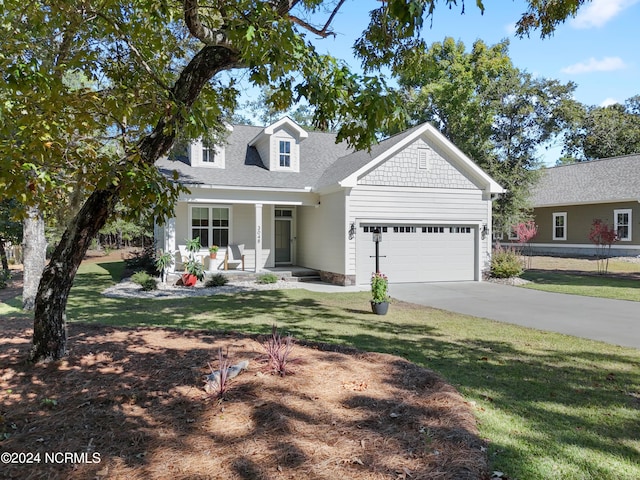 cape cod-style house with a porch, a front lawn, and a garage