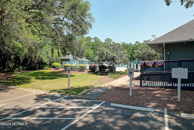 view of community with a yard