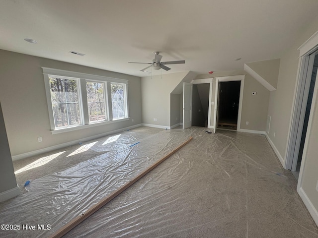 additional living space featuring visible vents and baseboards