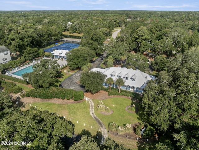 aerial view with a wooded view