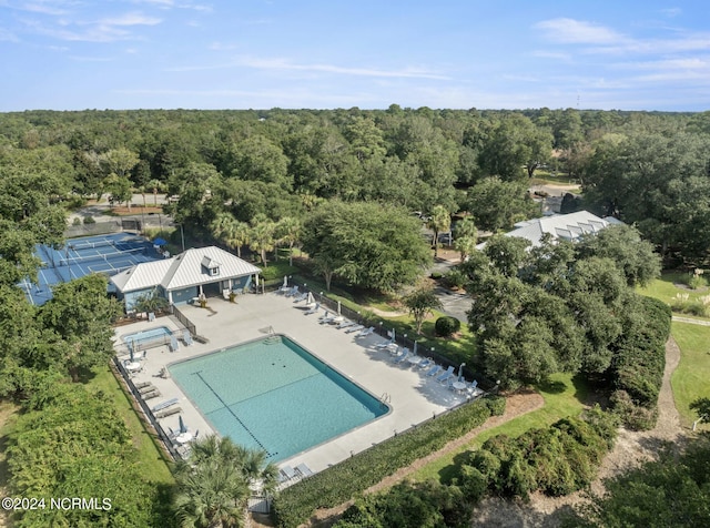 bird's eye view featuring a forest view