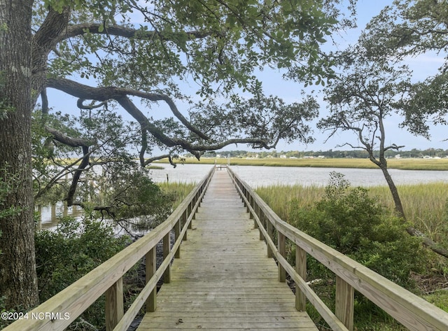 dock area featuring a water view