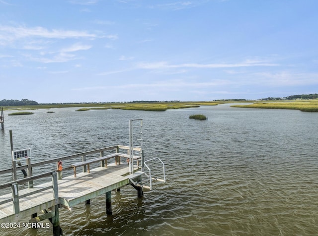 view of dock with a water view