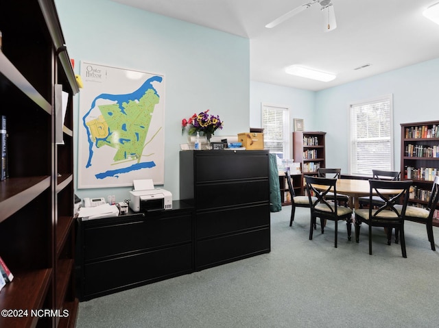 home office with ceiling fan and visible vents