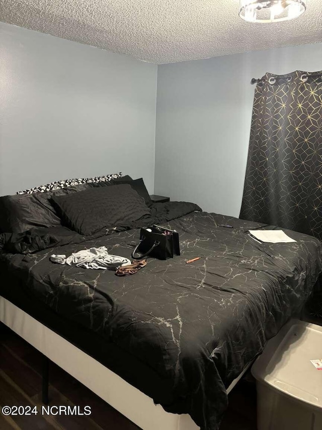 bedroom with a textured ceiling