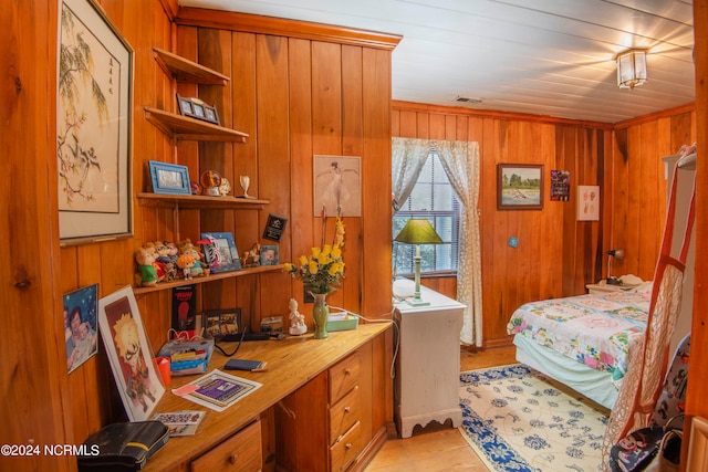 bedroom with wooden walls