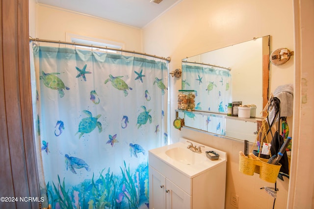 bathroom featuring vanity and walk in shower