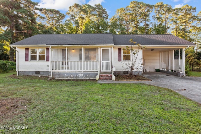 ranch-style house with a front lawn and covered porch