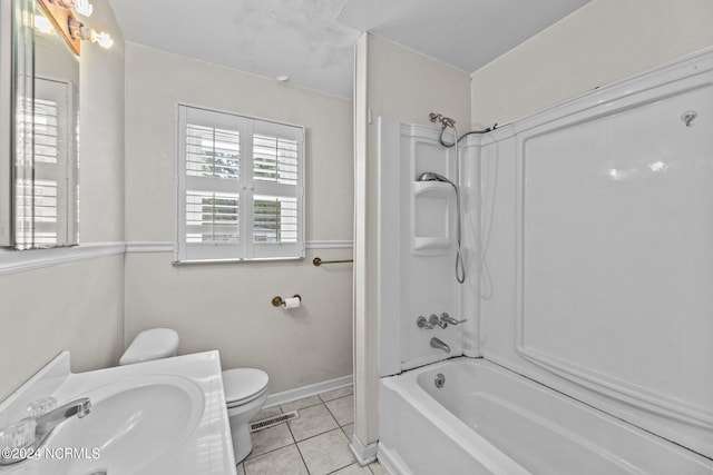 full bathroom featuring vanity, tile patterned floors, toilet, and shower / bath combination