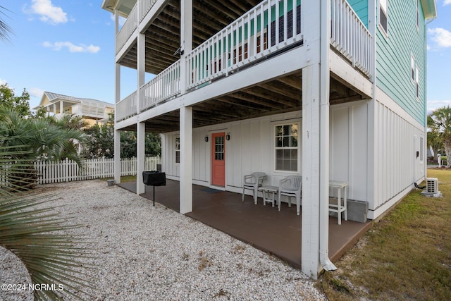 exterior space featuring a wooden deck and central AC unit