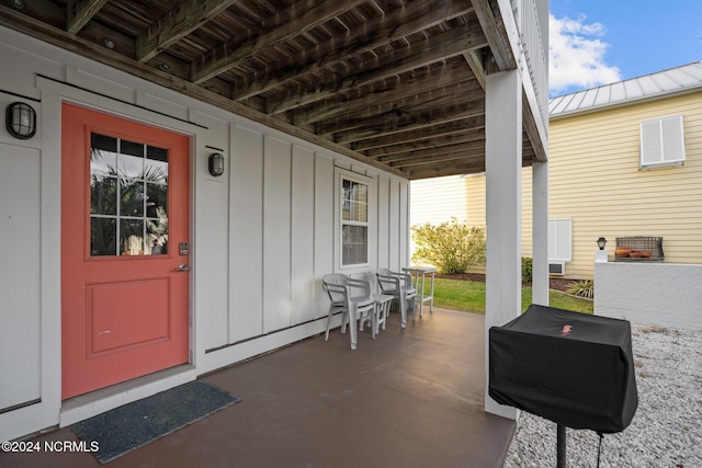 view of patio with a grill