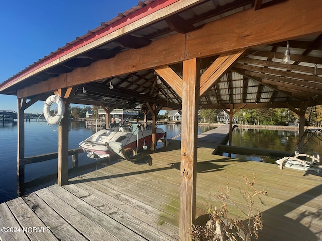 dock area featuring a water view