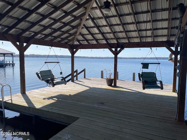 dock area featuring a water view