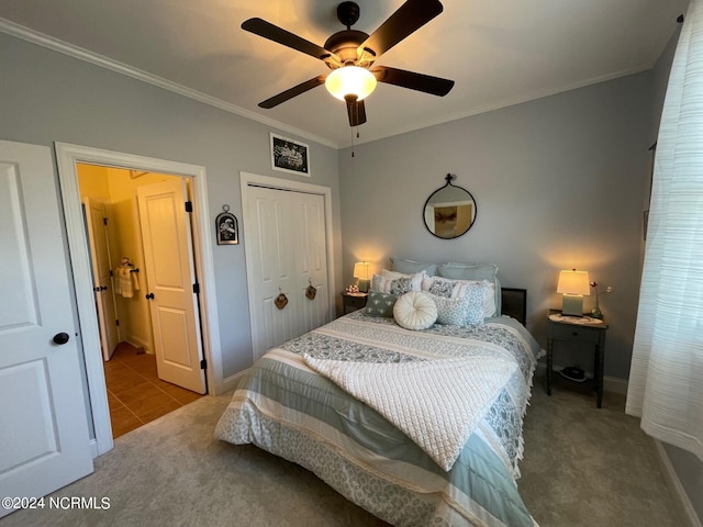 bedroom featuring crown molding, light colored carpet, a closet, and ceiling fan