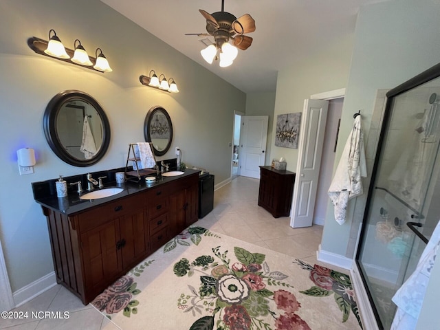 bathroom featuring vanity, ceiling fan, tile patterned floors, and a shower with shower door