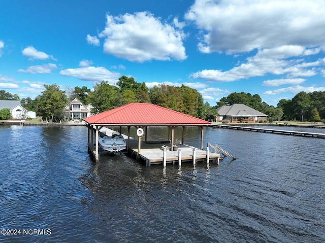 dock area featuring a water view