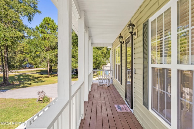 wooden deck featuring a porch