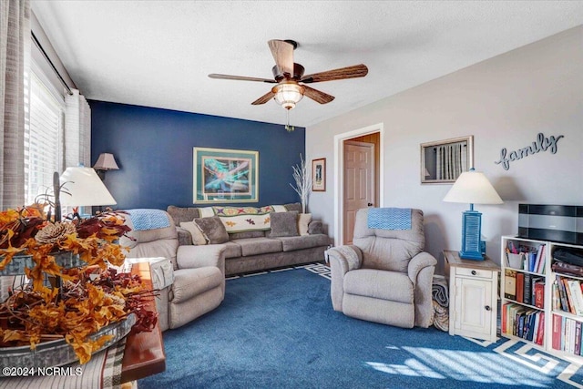 living room with carpet and ceiling fan