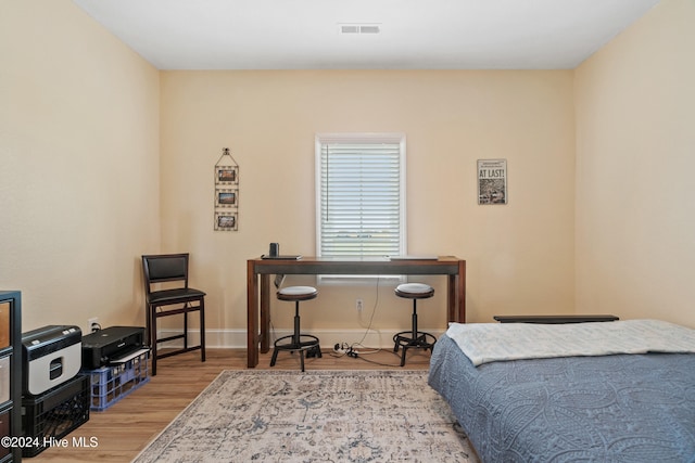 bedroom featuring light hardwood / wood-style flooring