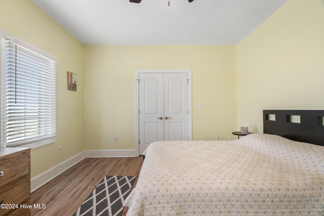 bedroom featuring a closet, ceiling fan, and hardwood / wood-style floors