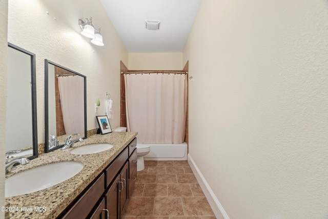 full bathroom featuring vanity, toilet, and shower / bath combo with shower curtain