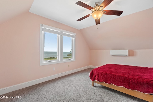 bedroom with carpet flooring, vaulted ceiling, a wall mounted air conditioner, and ceiling fan