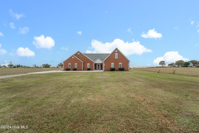 log home with a front yard and a rural view