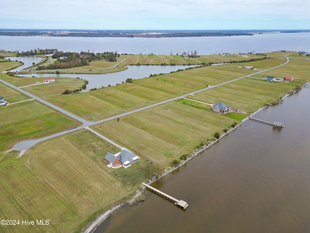 bird's eye view featuring a water view and a rural view