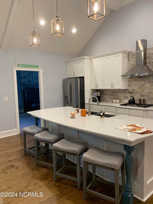 laundry area with tile walls and separate washer and dryer