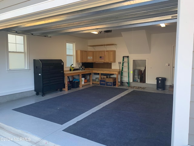 bedroom with ceiling fan, carpet flooring, and multiple windows