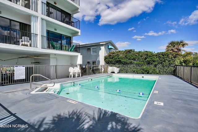 view of pool with a patio