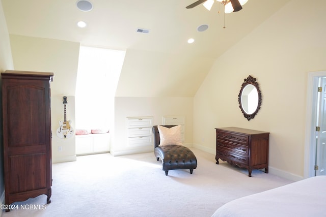 bedroom featuring lofted ceiling, light colored carpet, and ceiling fan