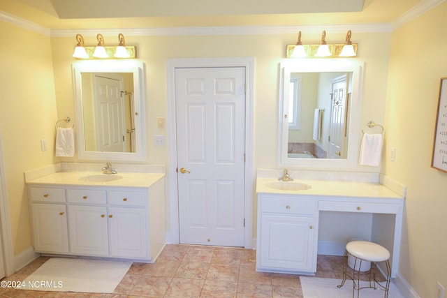 bathroom featuring vanity and crown molding