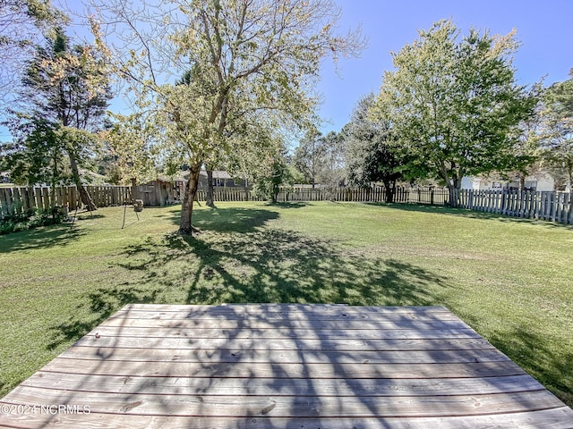 deck featuring a yard