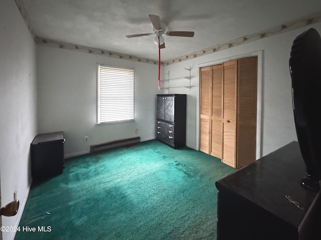 unfurnished bedroom with ceiling fan, a closet, a baseboard radiator, and dark colored carpet