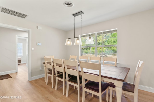 dining space featuring light hardwood / wood-style flooring