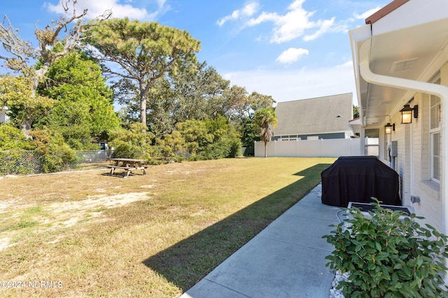 view of yard with a patio area